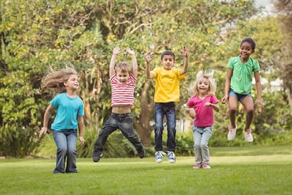 Photo of a group of children jumping